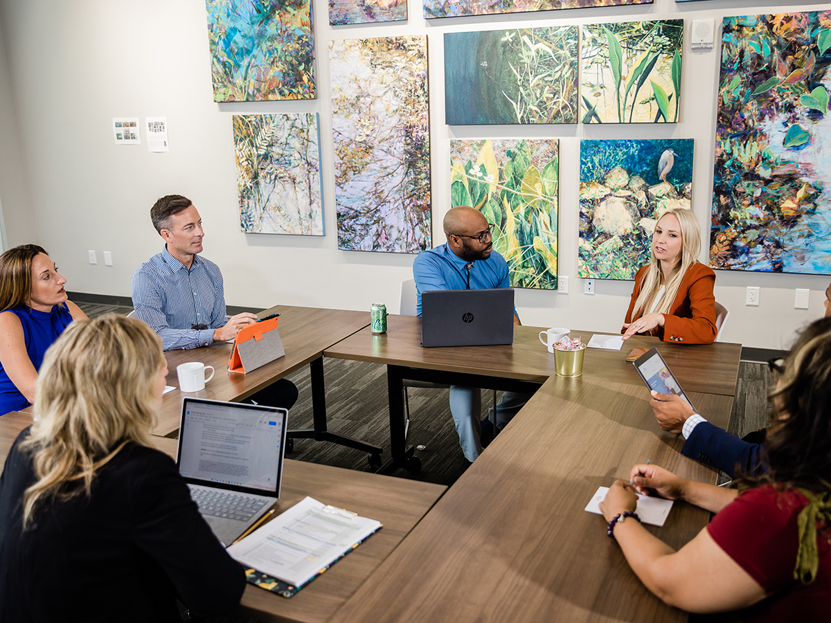 people sitting in a meeting